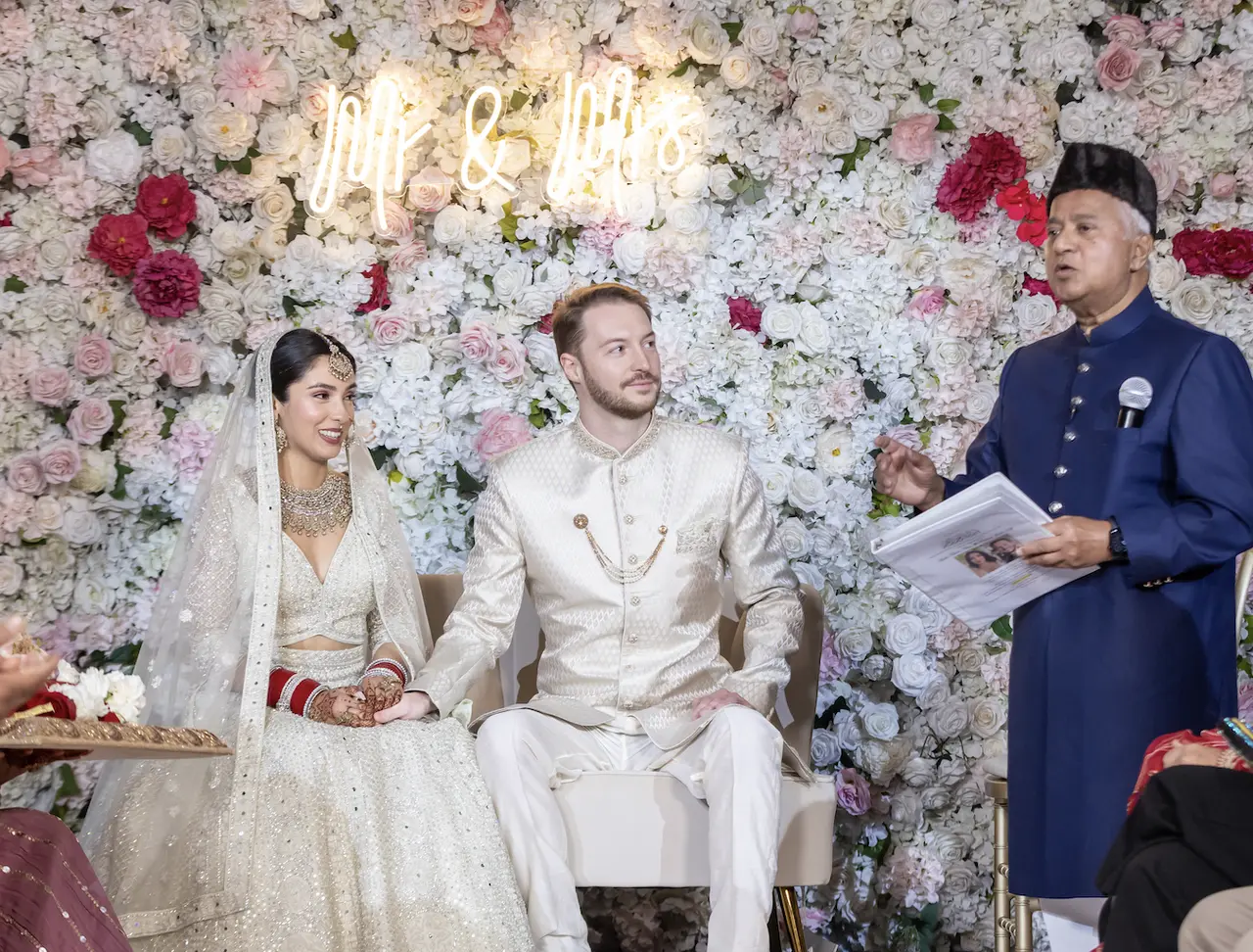 Dr. Mike Ghouse with an interfaith wedding couple