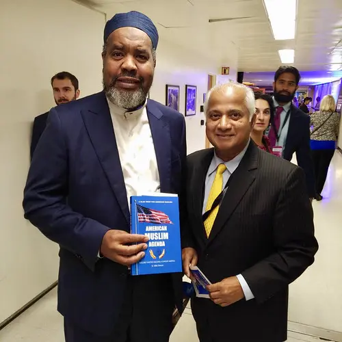 Dr. Mike Ghouse presenting American Muslim Agenda to a community leader