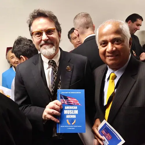 Dr. Mike Ghouse sharing American Muslim Agenda at an event
